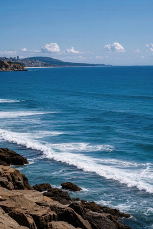 Rocky coast of the Atlantic Ocean in Portugal, with a view of the city of Cabo da Rocaの素材