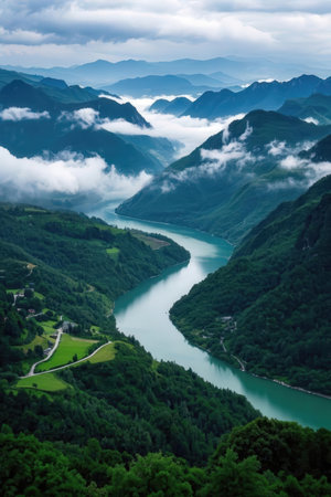 Mountain landscape with a lake in the middle of the valley.の素材