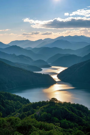 Beautiful landscape of the lake and mountains at sunset in the summerの素材