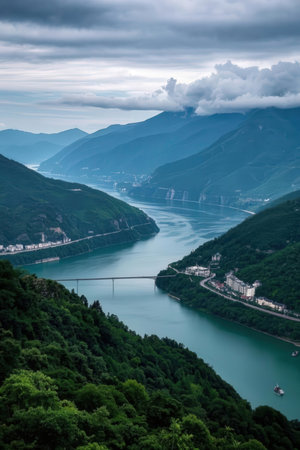 Mountain landscape with a view of the lake and the bridge.の素材