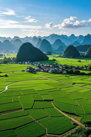 Beautiful landscape of rice fields and karst mountains in Chinaの素材