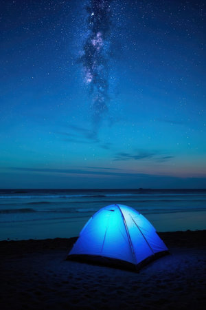 Camping on the beach at night with starry sky and Milky Wayの素材