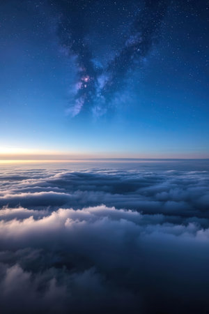 Aerial view of clouds and starry sky at sunrise. Nature backgroundの素材