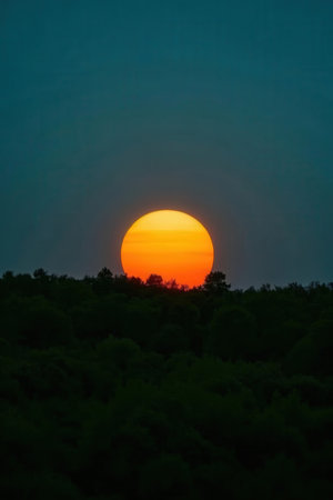 Sunset over the forest in Tuscany, Italy at summerの素材