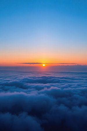 Beautiful sunrise above the clouds in the morning. Nature background.の素材