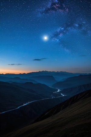 Mountain landscape with milky way and stars in the night skyの素材