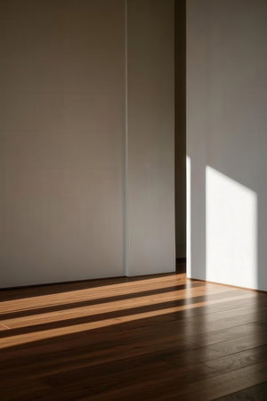 interior of empty room with white walls and wooden floor, nobodyの素材