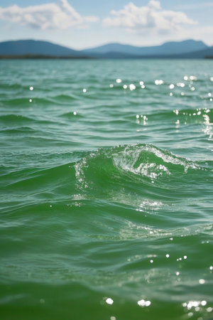 Water splash on the surface of the lake. Shallow depth of field.の素材