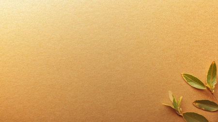 green leaves on brown paper background with copy space for text or imageの素材