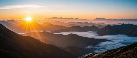 Sunrise over the clouds. Panoramic view of the mountainsの素材