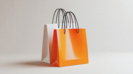 Orange shopping bag with minimalist backgroundの素材