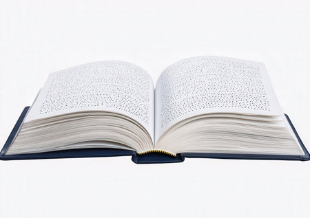 Open book on a white background, close-up, isolated.の素材