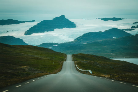 Icelandic landscape with road and melting glacier. Travel concept.の素材