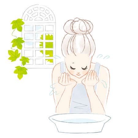 Upper body of a young woman washing her face.のイラスト素材