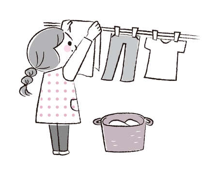 A girl helping with laundry.のイラスト素材