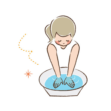 Color line drawing of a woman taking a hand bath.のイラスト素材
