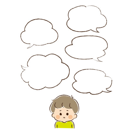 The upper body of a boy who is puzzled by being given a lot of information at once.のイラスト素材