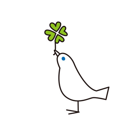A white bird holding a four-leaf clover in its mouth.のイラスト素材