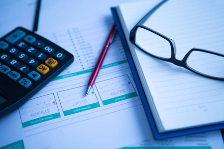 Financial statements glasses and calculator