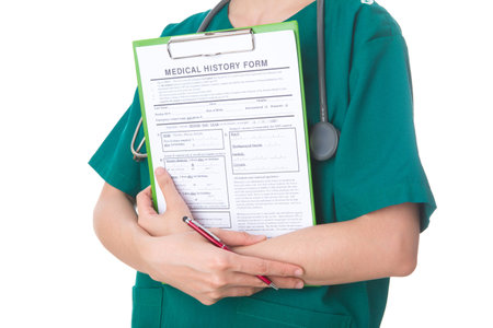 medical doctor with clipboard, isolated on white backgroundの写真素材