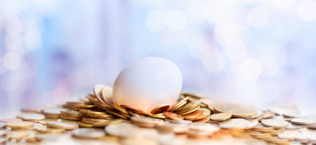 Hatched egg and coins stack. Pension fund, 401K, Strategies and plan for passive income. Saving...