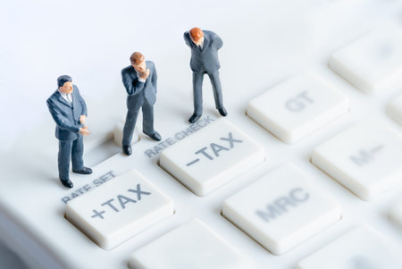 Business mans standing on calculator. Calculation and tax payment. Interest rate financial and...