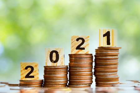 2021 and Coins stack. Pension fund, 401K, Passive income. Investment and retirement. Business...