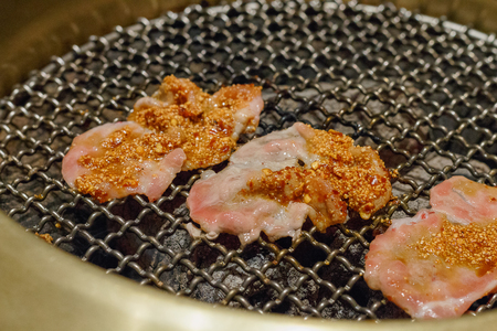 Yakiniku fresh pork sliced with sauce tilの写真素材
