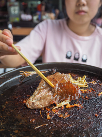 Grilled raw meat beef  a food cooking in buffet restaurantの写真素材