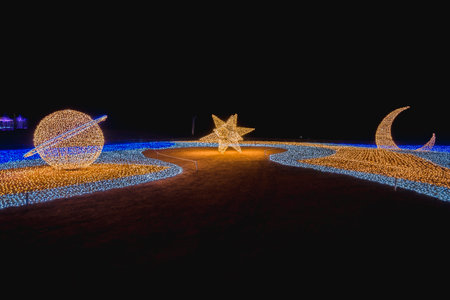 The scenery of the LED light bulb decorated as stars at the Village of Illumination at Singha Park Chiang Rai, Thailand.の写真素材