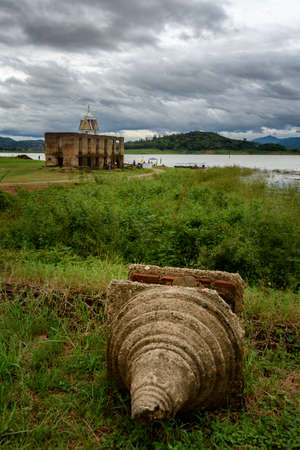 Drowned Buddhist church, old structure of Wat Wang Wiwekaram in of Songkaria river.の写真素材