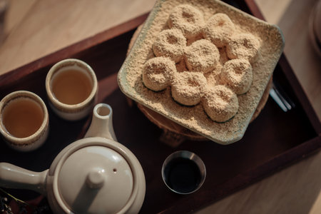 A set of tea and Roasted Mitarashi Dango with the sweet sauce, one of the most popular Japanese...