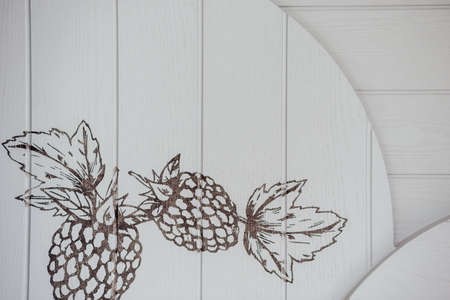 Fruit (raspberry) painted on a wooden background.の写真素材