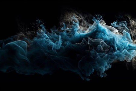 Blue smoke isolated on black background. abstract background. design element.の素材