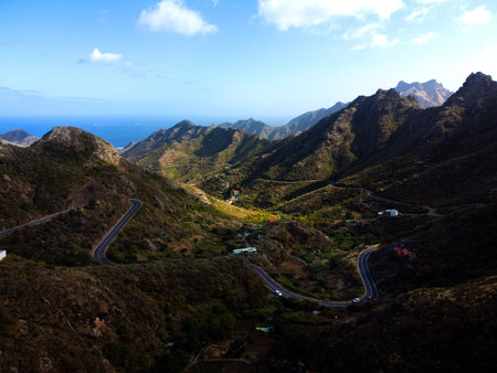 Great landscape of Anaga Mountains in Tenerife, Spain. Beautiful volcanic island. Asphalt curvy road...