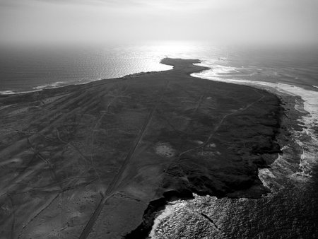 Aerial view of the coastline of Atlantic ocean in black and white