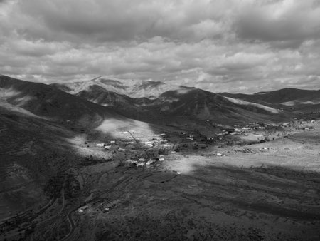 Aerial view of a small village in the mountains. Black and white.の写真素材