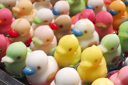 The jelly duck multicolored in plastic cups sold.の写真素材