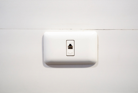 Telephone connection mount the switch in the wrong direction.の写真素材