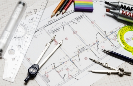 dividers, ruler and pencil lay on the schemeの写真素材