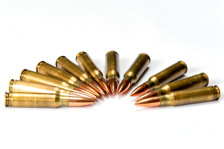 Group several rifle cartridges with reflectionsの写真素材
