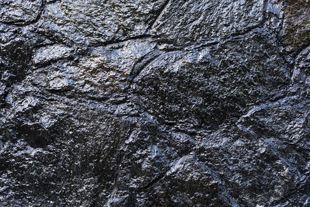 Dark brick wall, texture of black stone blocks, high resolution panorama. Background, textureの写真素材