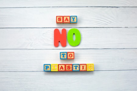 Say NO to plastic - on wooden cubes on wood background. Environmental, pollution concept. Ban single use plastic.の写真素材