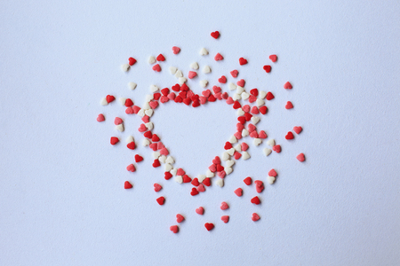 Valentine day background with red hearts on white background , top viewの写真素材
