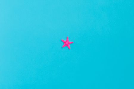 Pink glasses and pink camera on blue background. Minimal concept. Creative concept. Hot Summer. Pop Art. Bright Sweet fashion Style. Vanilla Pastel Colorの写真素材