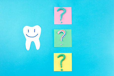 Symbol of question mark from toothpaste. Copy space for text. toothpaste selection concept. Concept...