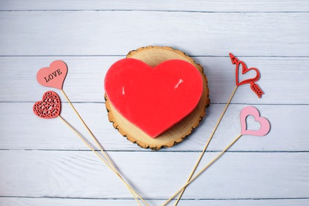 love hearts candle on white wooden background. Valentine's day celebration concept. Top view. Flat lay. 8 marchの写真素材