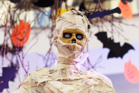 Scary Halloween Mummy in the mist and halloween decoration. Mummy costume. Mummy in the halloween conceptの写真素材