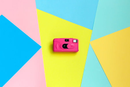 Fashion Film Camera. Minimal Creative style with colorful paper backdrop Pastel Sweet Style. Flat...