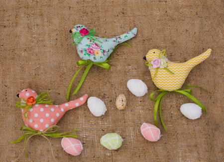Textile spring birds and eggs. Decorative toys of handwork. Easter decorations. easter concept